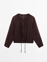 Flowing semi-sheer bomber jacket