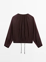 Flowing semi-sheer bomber jacket