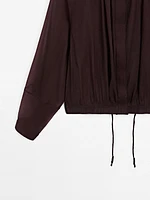 Flowing semi-sheer bomber jacket