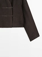 Linen blend jacket with leather fastening detail