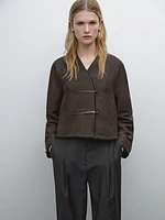 Linen blend jacket with leather fastening detail