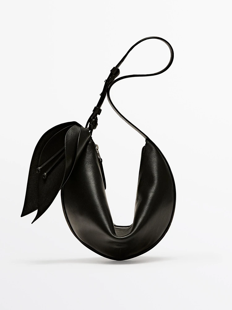 Nappa leather half-moon bag with flower detail