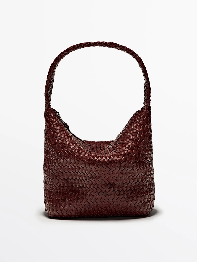 Sac seau tressé en cuir nappa