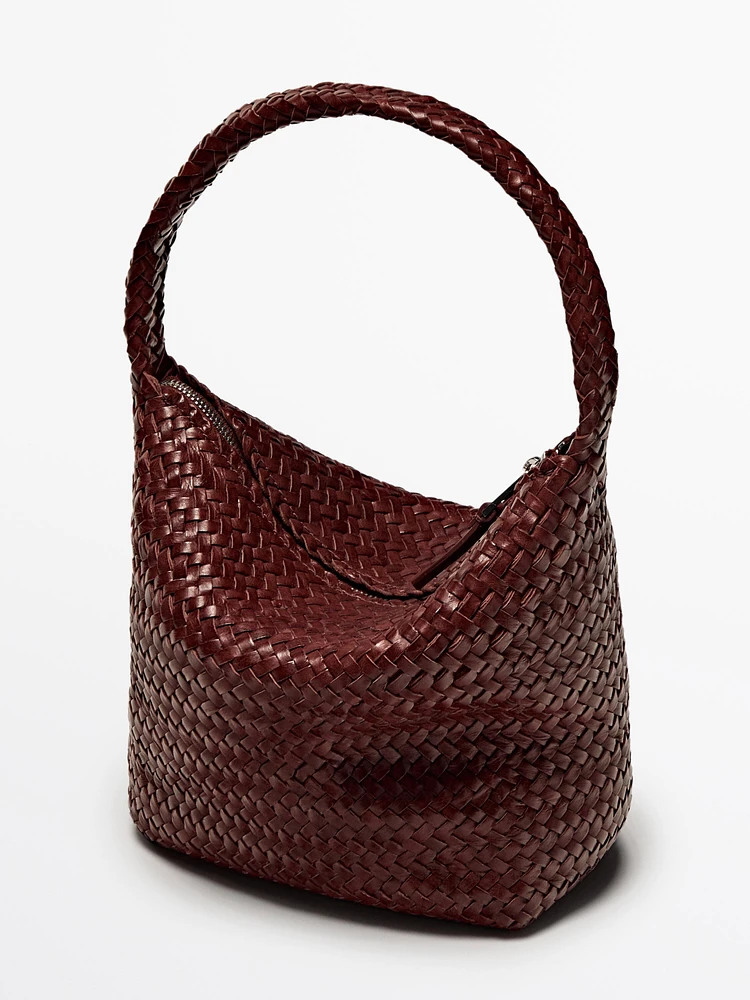 Sac seau tressé en cuir nappa