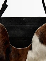 Animal print hair-on leather bucket bag