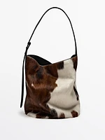 Animal print hair-on leather bucket bag