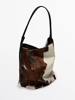 Animal print hair-on leather bucket bag