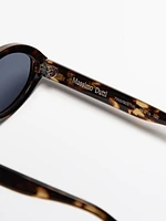 Tortoiseshell-effect oval sunglasses