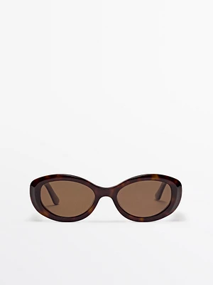 Oval tortoiseshell-effect sunglasses