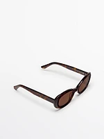 Oval tortoiseshell-effect sunglasses