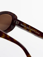 Oval tortoiseshell-effect sunglasses