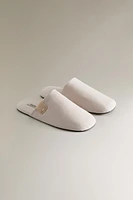 CHAUSSONS OUVERTS À L’ARRIÈRE TISSU TECHNIQUE