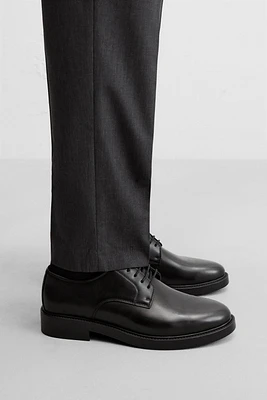 CHAUSSURES HABILLÉES