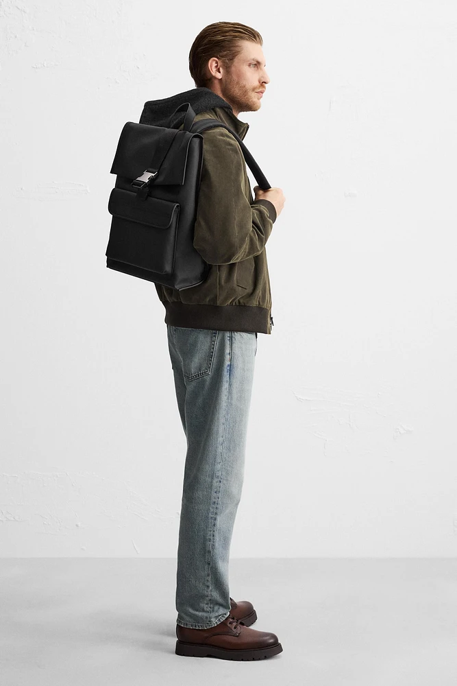 RUBBERIZED FLAP BACKPACK