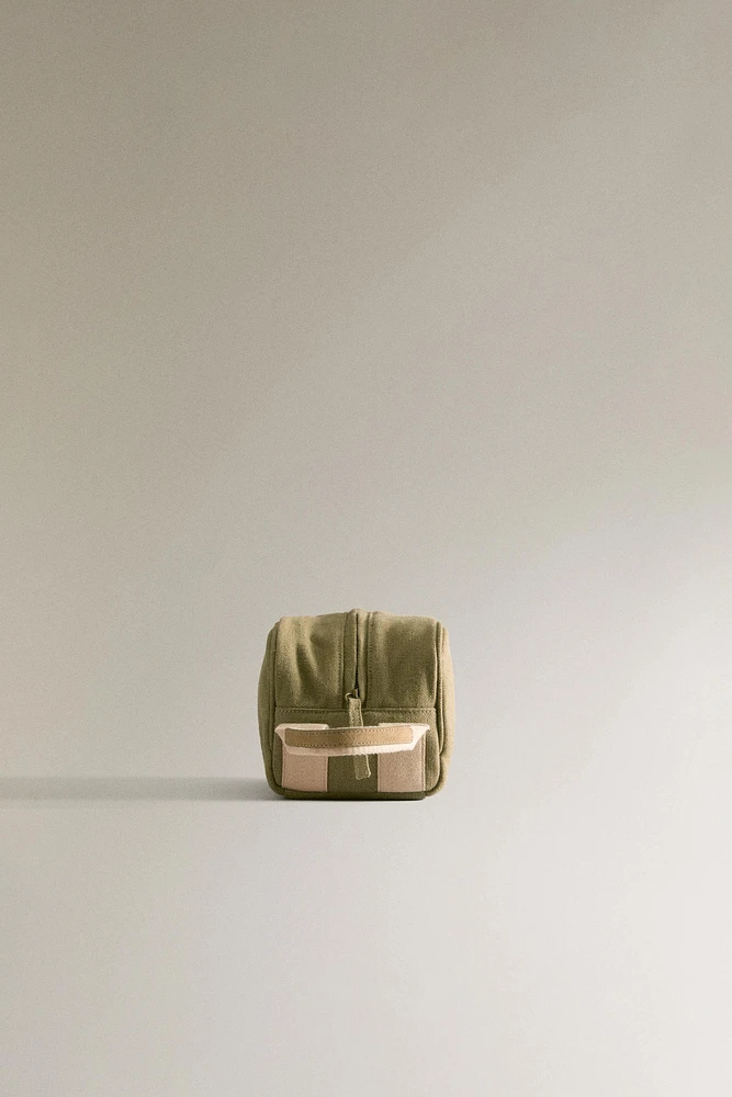 MINIMALIST MAKEUP BAG WITH LEATHER DETAIL