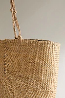 BRAIDED STRAW BAG WITH KNOTS