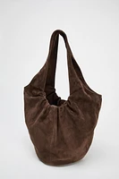 GATHERED SUEDE BUCKET BAG