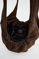 GATHERED SUEDE BUCKET BAG