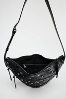 STUDDED ROCKER CROSSBODY BAG