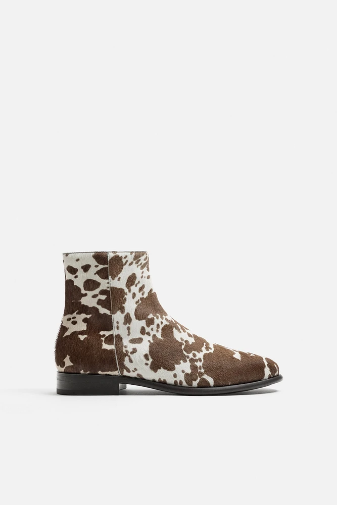 ANIMAL PRINT LEATHER BOOTS