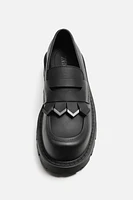 VOLUMINOUS FRINGED LOAFERS