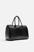 EMBOSSED TRAVEL BAG