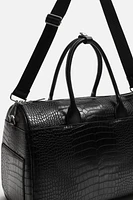 EMBOSSED TRAVEL BAG