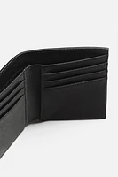 TEXTURED VERTICAL WALLET