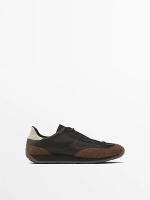 Leather trainers with contrast pieces