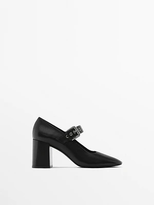 High-heel shoes with buckled strap