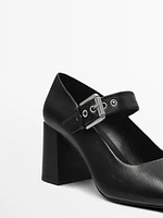 High-heel shoes with buckled strap