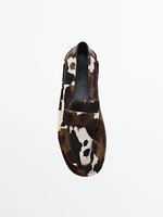 Animal print furskin loafers