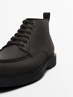 Oiled ankle boots with moc toe