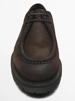 Oiled shoes with moc toe