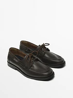 Brown leather deck shoes