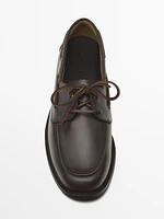 Brown leather deck shoes