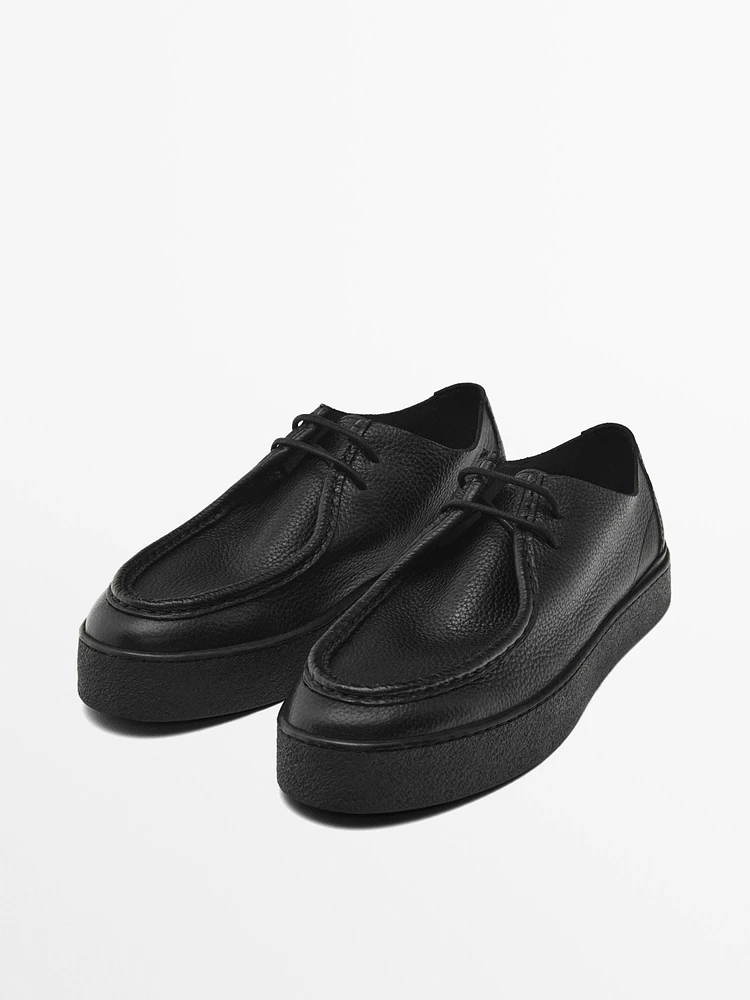 Chaussures noires en cuir souple