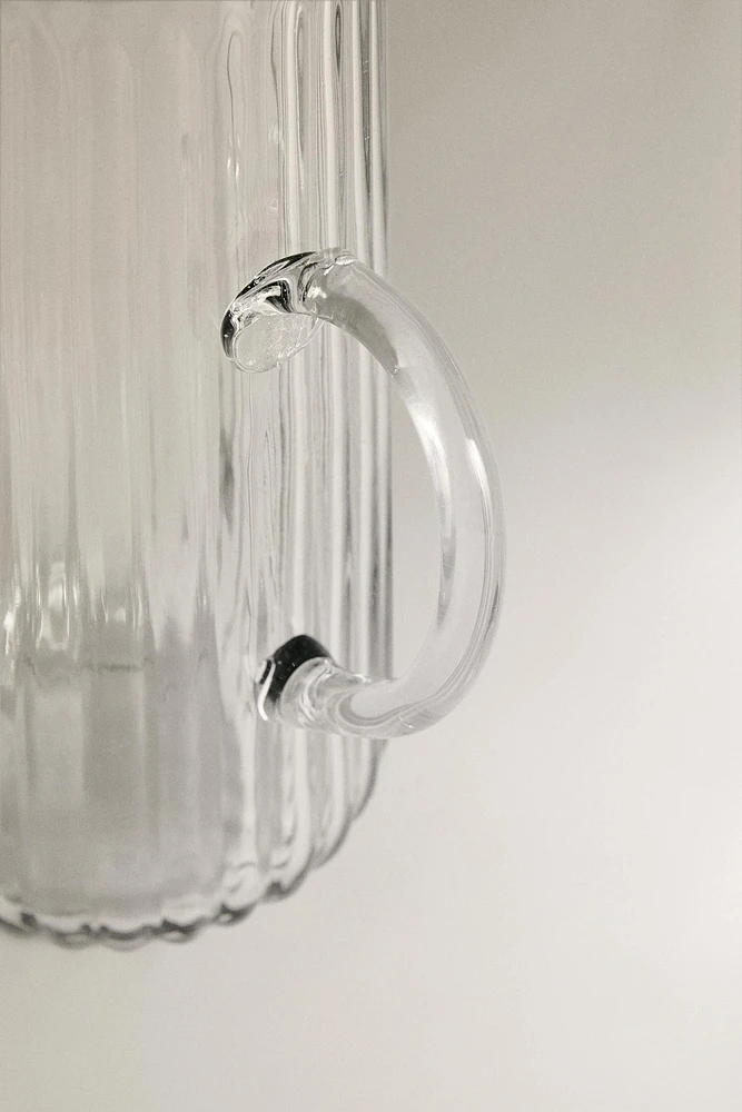 RAISED DESIGN GLASS PITCHER