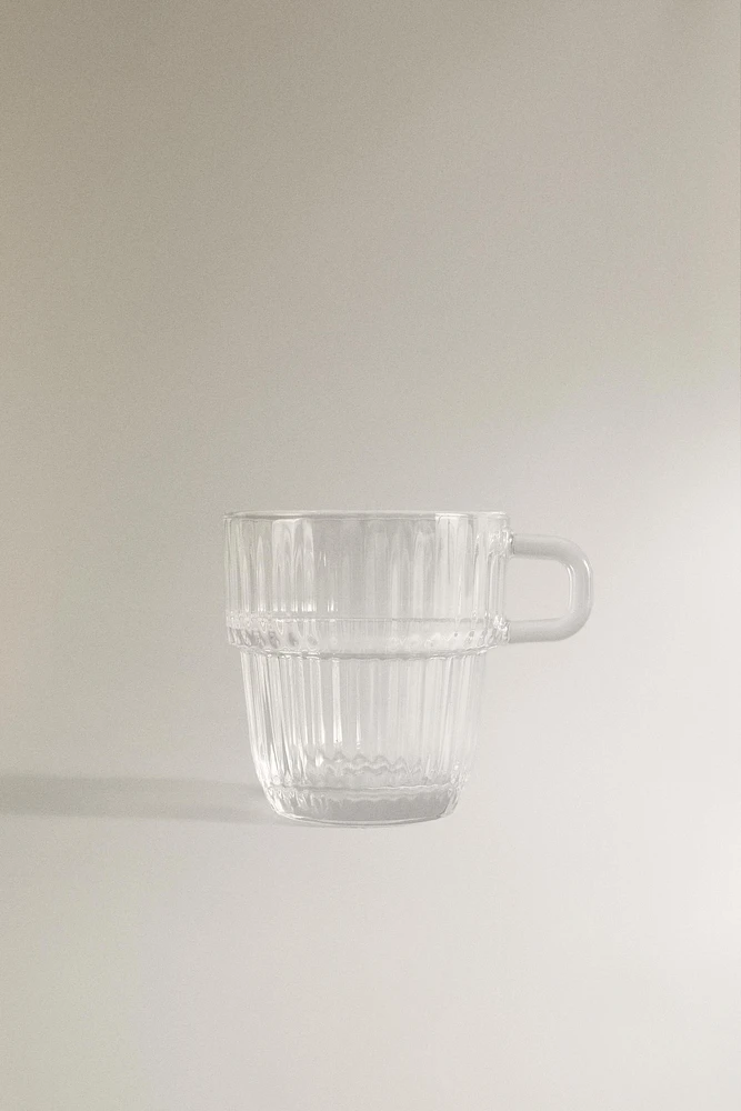 GLASS CUP WITH RAISED DESIGN