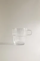 GLASS CUP WITH RAISED DESIGN