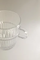 GLASS CUP WITH RAISED DESIGN