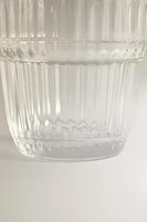 GLASS CUP WITH RAISED DESIGN