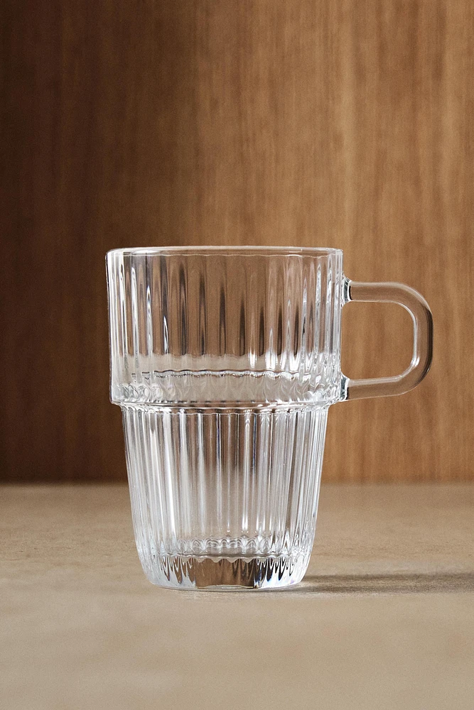 GLASS MUG WITH A RAISED DESIGN