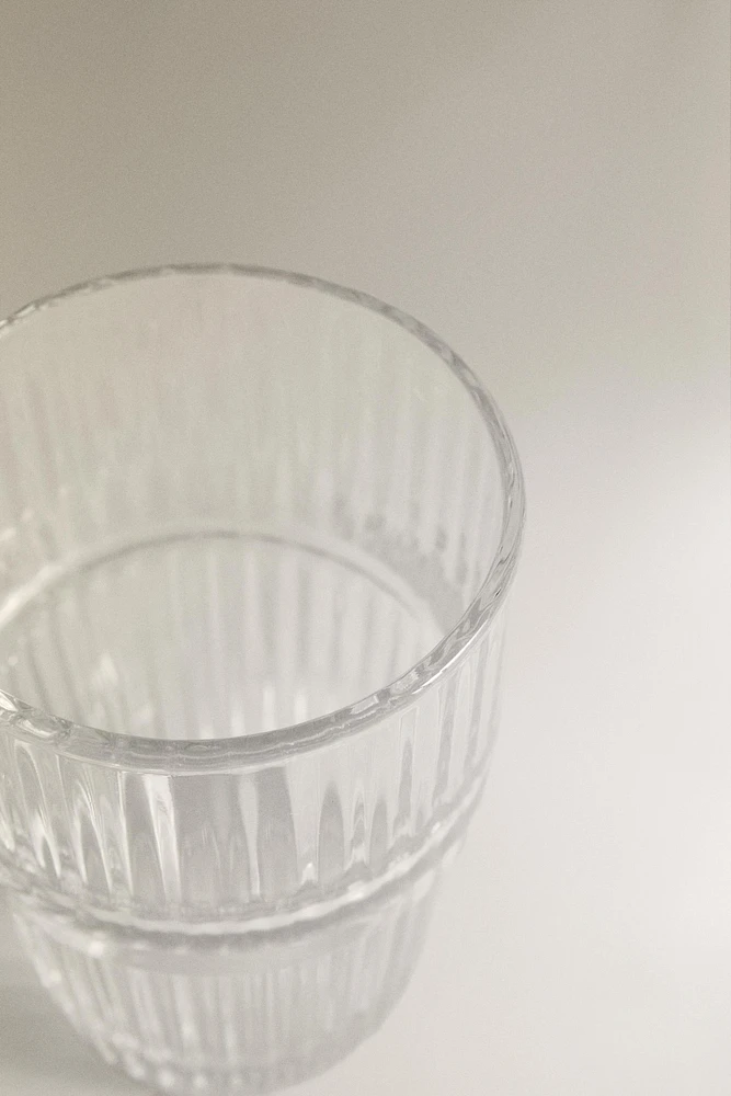 GLASS MUG WITH A RAISED DESIGN