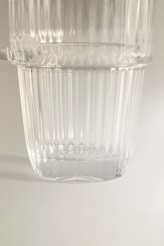 GLASS MUG WITH A RAISED DESIGN