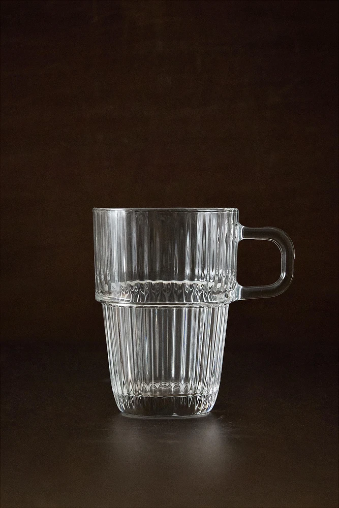 GLASS MUG WITH A RAISED DESIGN