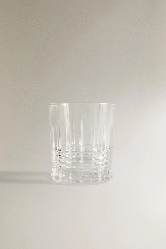 CRYSTALLINE TUMBLER WITH RAISED DESIGN