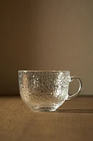 GLASS CUP WITH RAISED DESIGN