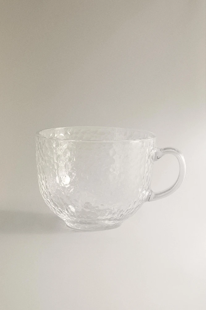 GLASS CUP WITH RAISED DESIGN