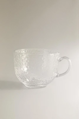 GLASS CUP WITH RAISED DESIGN